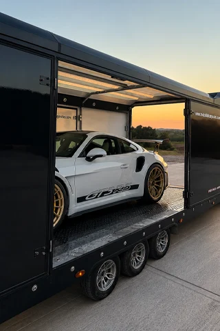 Sports car in an enclosed trailer