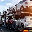 Multi-vehicle hauler loaded